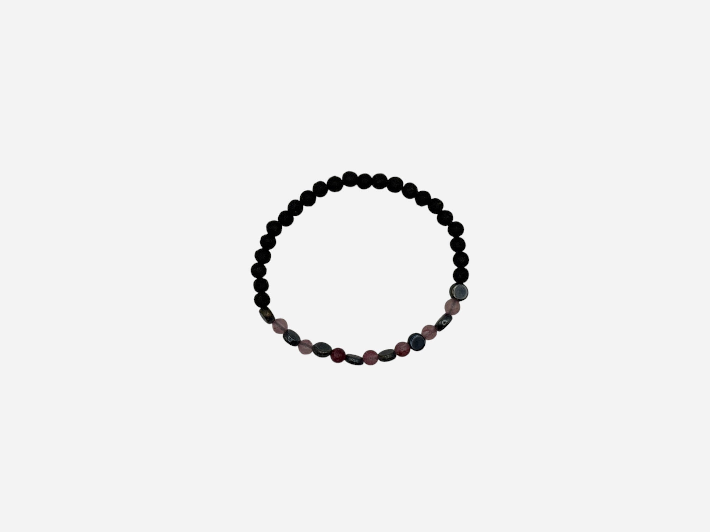SPARQ beaded stretch bracelet with matte black lava beads, pink quartz, red jasper, and blue-grey stones. Elastic design.