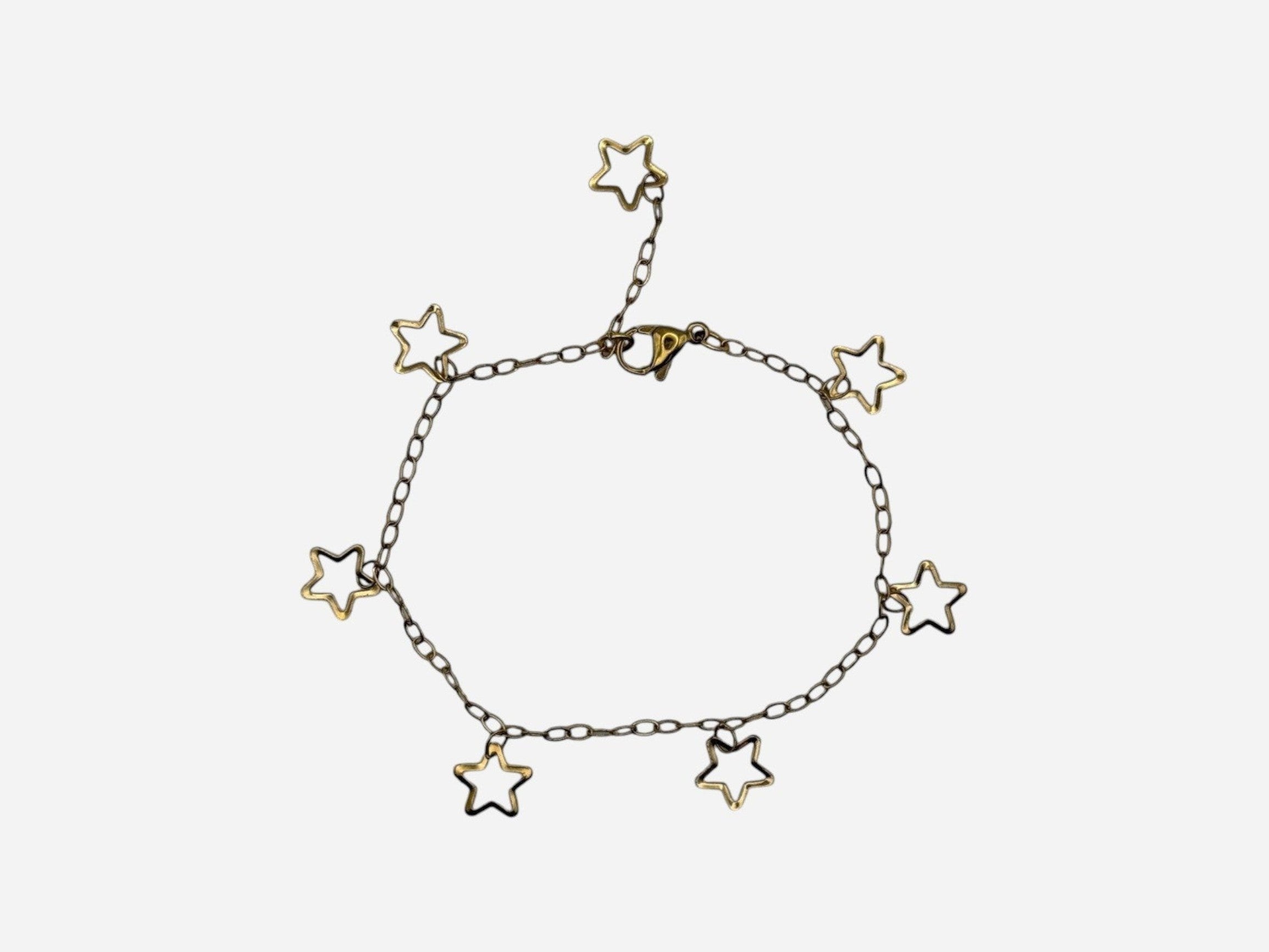 SPARQ delicate gold-tone stainless steel bracelet with multiple open star charms and an adjustable clasp.