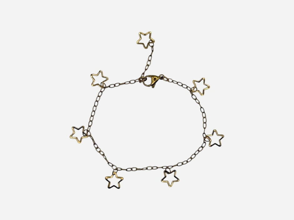 SPARQ delicate gold-tone stainless steel bracelet with multiple open star charms and an adjustable clasp.