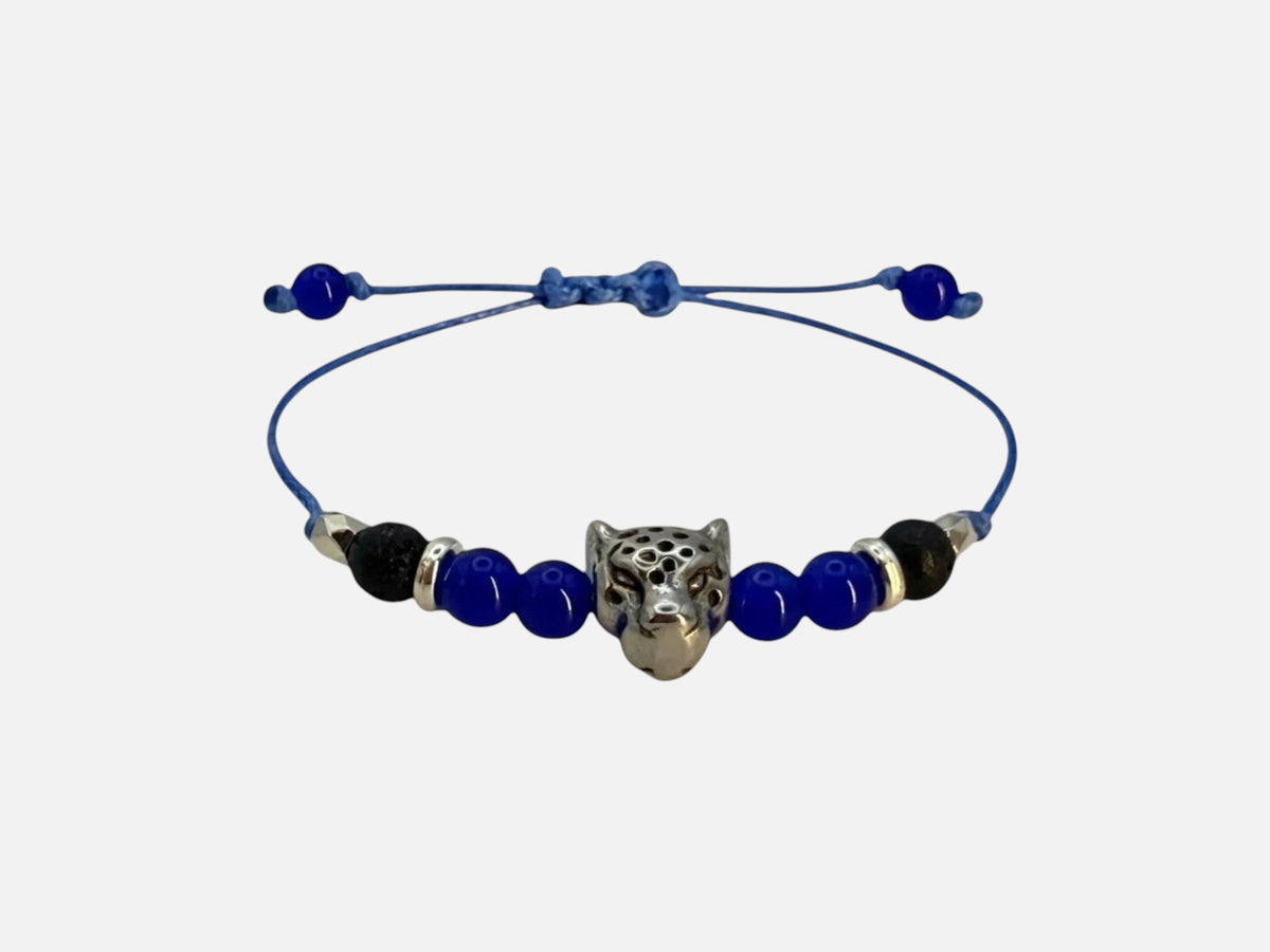 SPARQ blauwe kralenarmband voor dames met zilverkleurige luipaardbedel en verstelbaar blauw koord