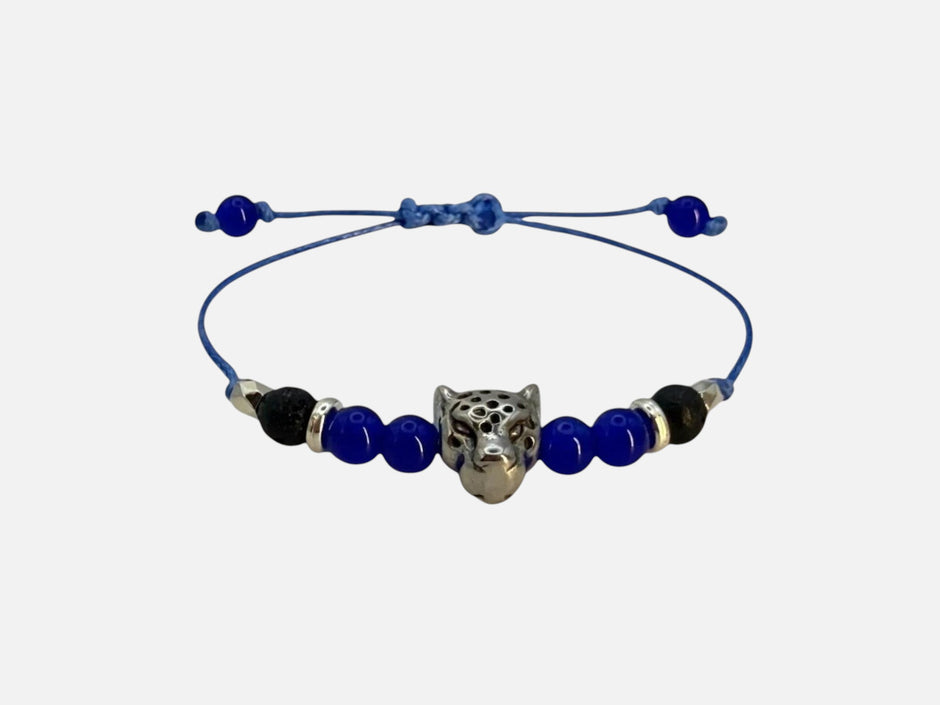SPARQ blauwe kralenarmband voor dames met zilverkleurige luipaardbedel en verstelbaar blauw koord