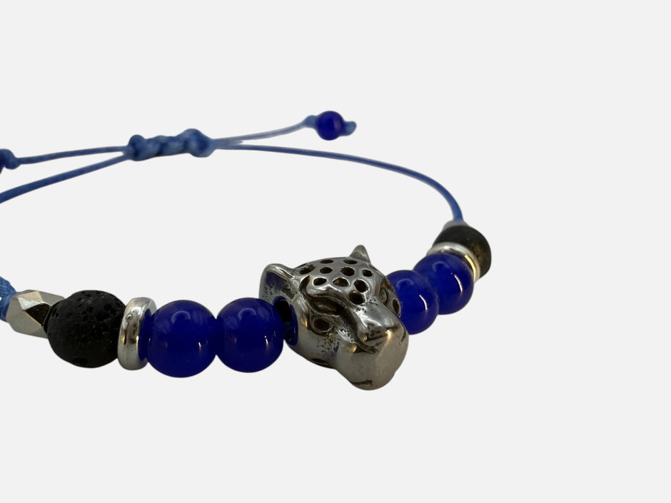 SPARQ blauwe kralenarmband voor dames met zilverkleurige luipaardbedel en verstelbaar blauw koord