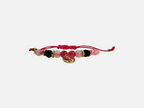 SPARQ handgemaakte kralenarmband met roze en zwarte kralen, goudkleurige accenten en een roze schelpbedel.