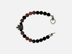 SPARQ kralenarmband met zwarte lavastenen, roze rhodoniet, zilveren schildpadbedel en hartvormige sluiting