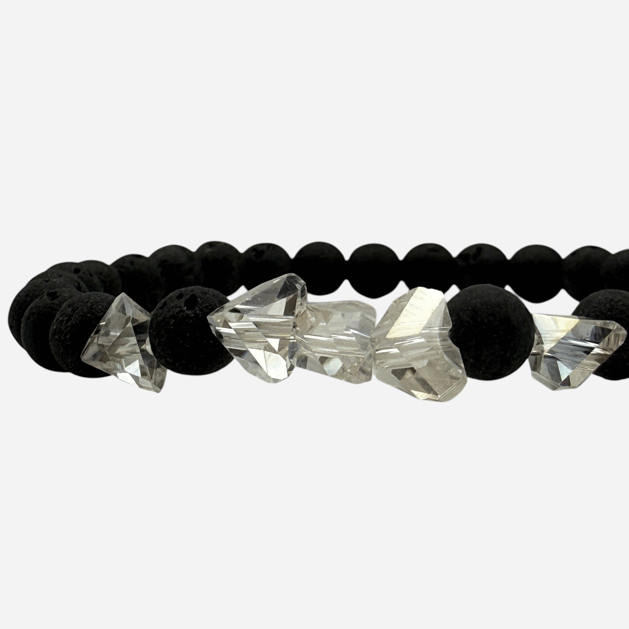 SPARQ black lava stone bracelet with clear faceted crystal accents. Elastic design.