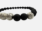 SPARQ handgemaakte kralenarmband met zwarte lavastenen en glanzende zilverkleurige accenten voor dames en heren