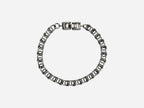 SPARQ silver-tone stainless steel double link chain bracelet with secure clasp closure.