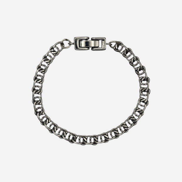 SPARQ silver-tone stainless steel double link chain bracelet with secure clasp closure.