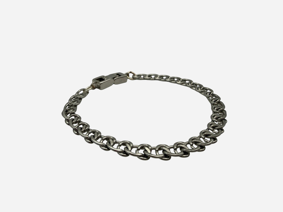 SPARQ silver-tone stainless steel double link chain bracelet with secure clasp closure.