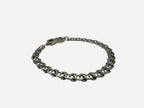SPARQ silver-tone stainless steel double link chain bracelet with secure clasp closure.