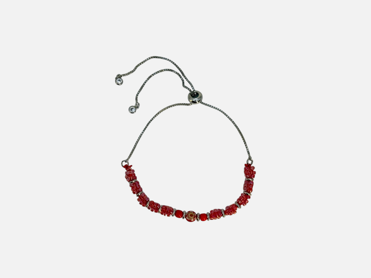 SPARQ verstelbare armband met rode kralen, zilverkleurige accenten en een unieke bloemenkraal